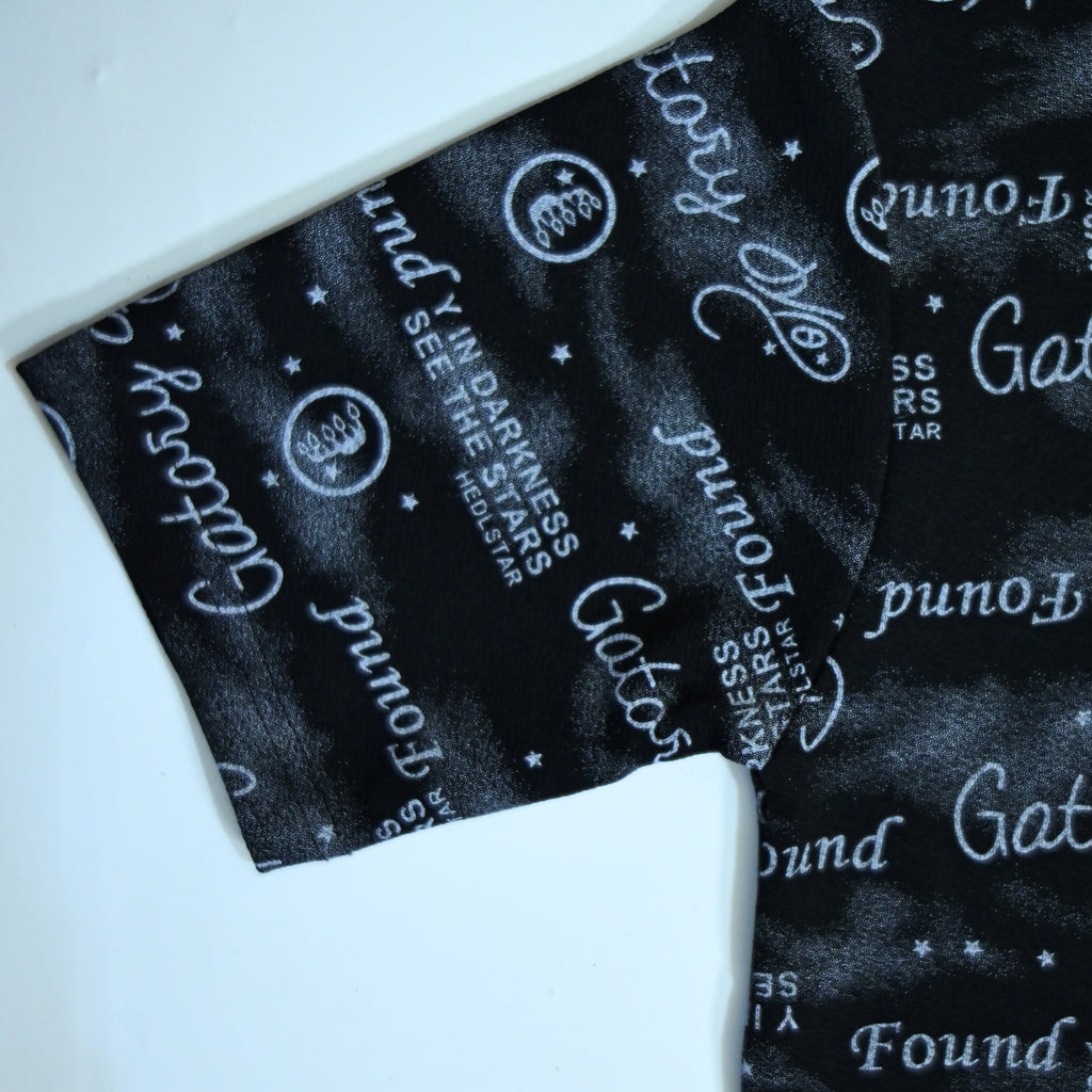 Black Typography Print Polo Shirt | Graphic Polo