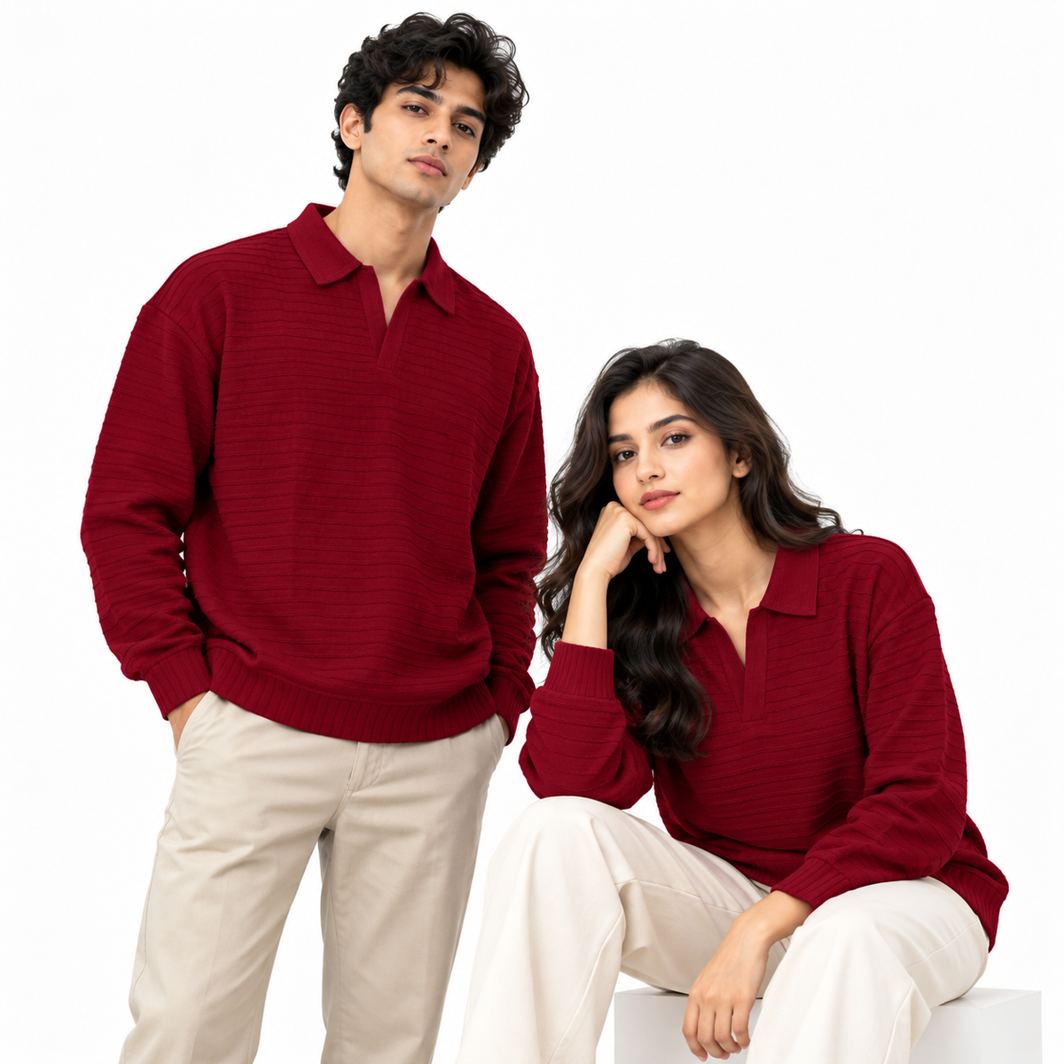 Male model wearing burgundy textured knit polo sweatshirt front view